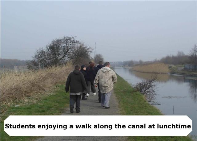 Picture of students walking along side a canal